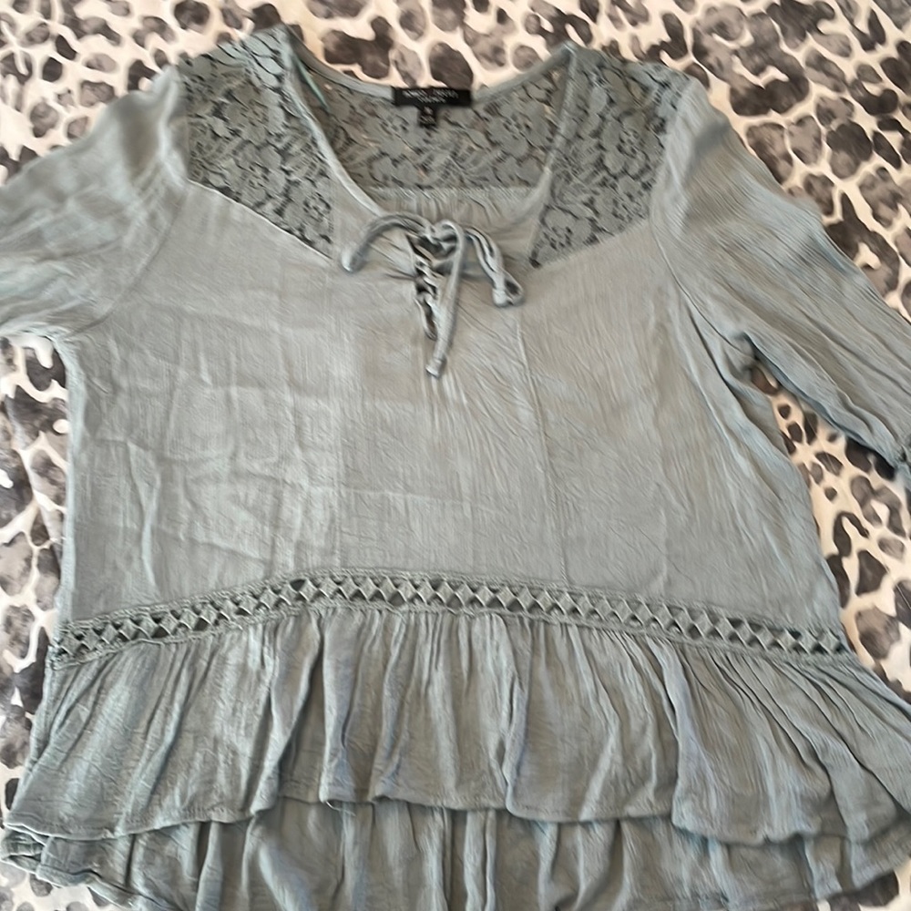 Woman teal coke red blouse. Size M